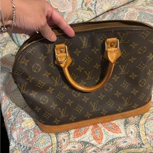 Vintage Alma bag used but in great condition bottom vachetta has water marks.